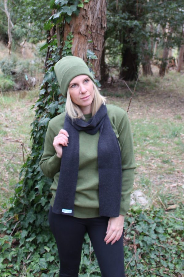 A lady wearing an Australian Made, Plain Adult Unisex Scarf in Bond Grey, made from Pure Australian Merino Wool