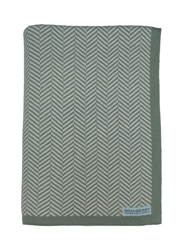 Arial View of Folded Pistachio Green Herringbone Blanket